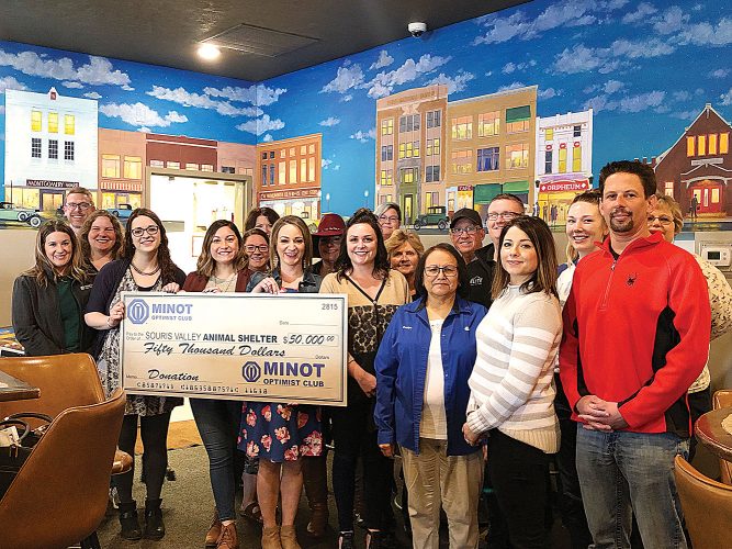 Minot Optimist Club presents 50,000 check to the Souris Valley Animal